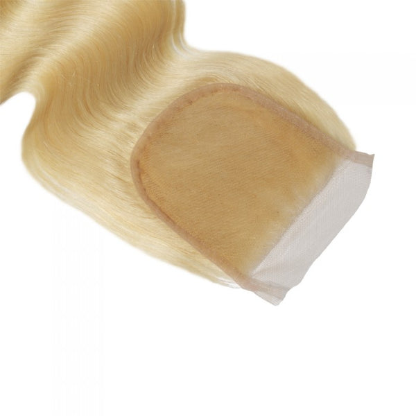 This is a Raw Indian Closure Body Wave Blonde Virgin Hair